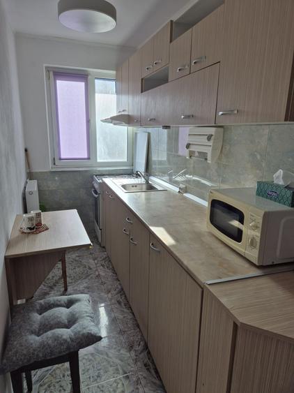 Apartament cu 2 camere semidecomandat în Moșnița Veche