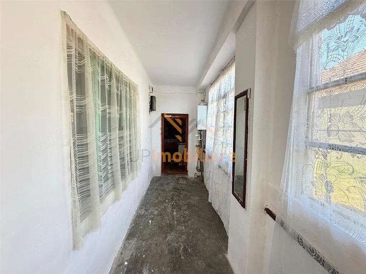 Casă cu Teren 990 Mp în Tărian