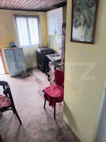 Casă individuală cu 2 camere decomandat cu Canalizare în Exterior Nord