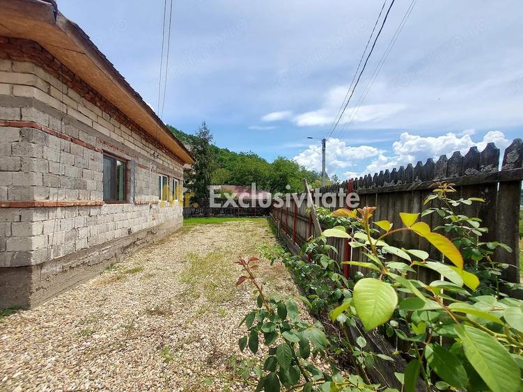 Casă cu Teren 405 Mp în Bascov