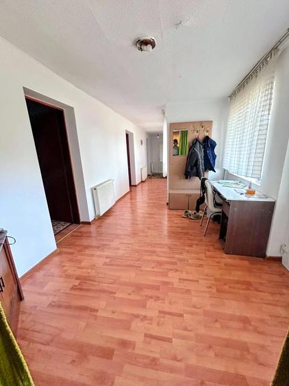 Casă cu 4 camere cu Teren 1800 Mp în Chizătău