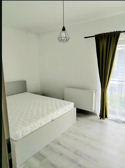 Apartament cu 3 camere decomandat în Borhanci
