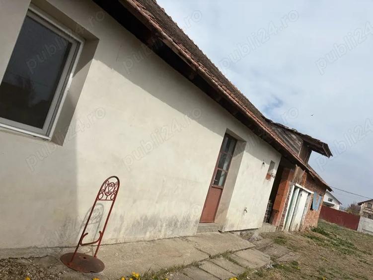 Casă cu Teren 1000 Mp în Central