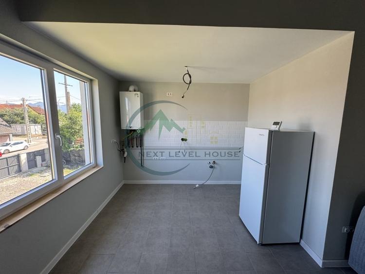Apartament cu 3 camere semidecomandat, mobilat în Sânpetru
