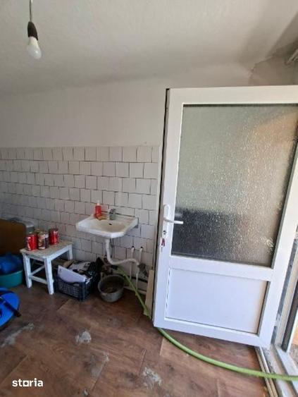 Casă cu 2 camere decomandat cu Teren 1150 Mp în Slimnic