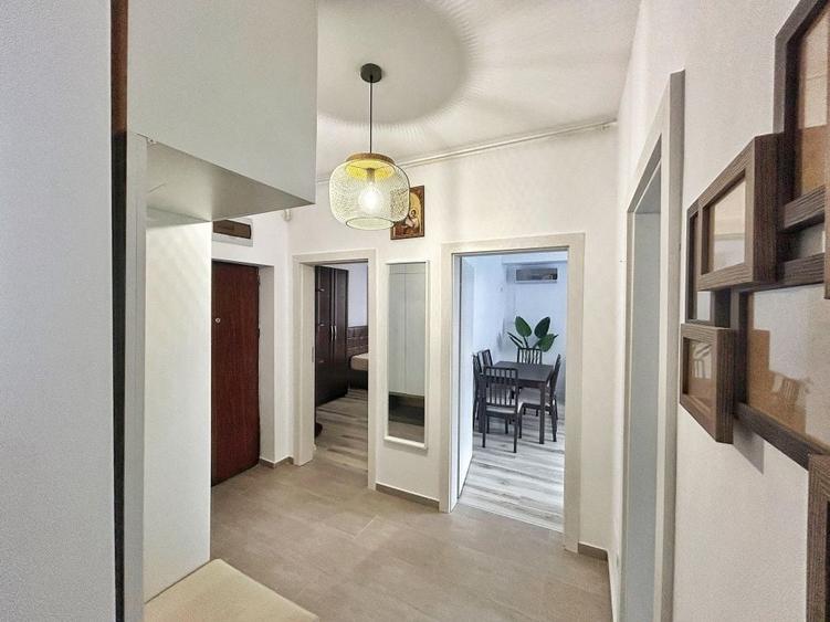 Apartament cu 3 camere decomandat în Cățelu