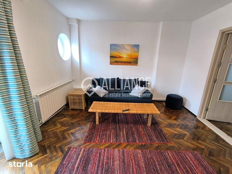 Apartament cu 3 camere semidecomandat, mobilat în Central