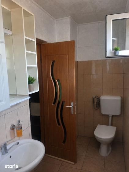 Casă cu 4 camere cu Teren 1100 Mp în Central