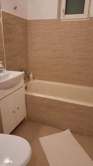 Apartament cu 2 camere semidecomandat, mobilat în Tei