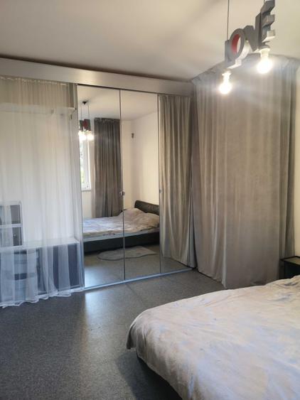 Apartament cu 3 camere decomandat în Romană