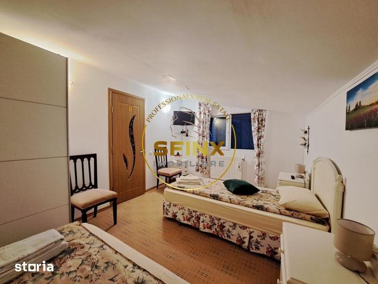 Casă cu 7 camere cu Teren 1955 Mp în Siriu