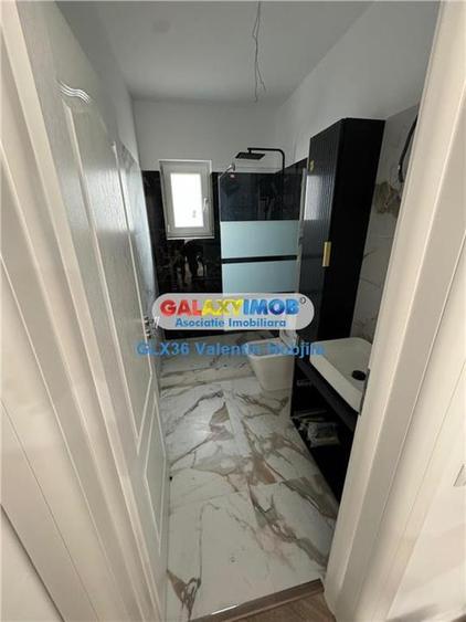 Casă cu 4 camere cu Teren 400 Mp în Central