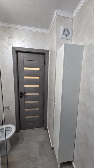Garsonieră decomandată în Titan