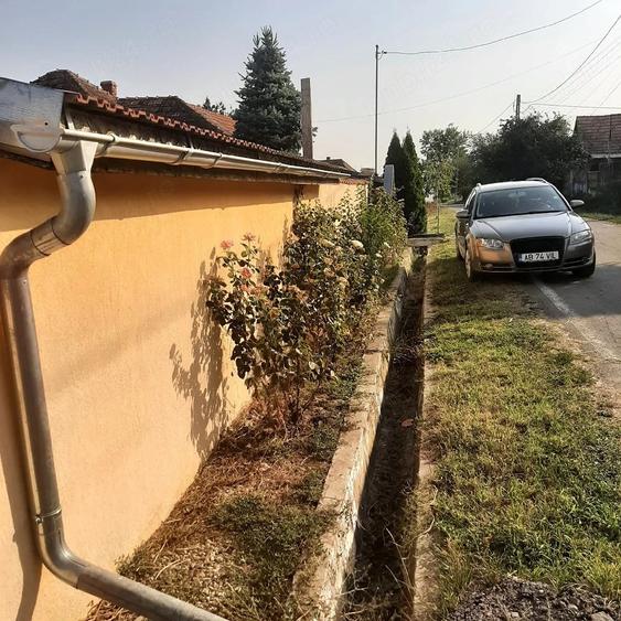 Casă cu Teren 8700 Mp în Căptălan