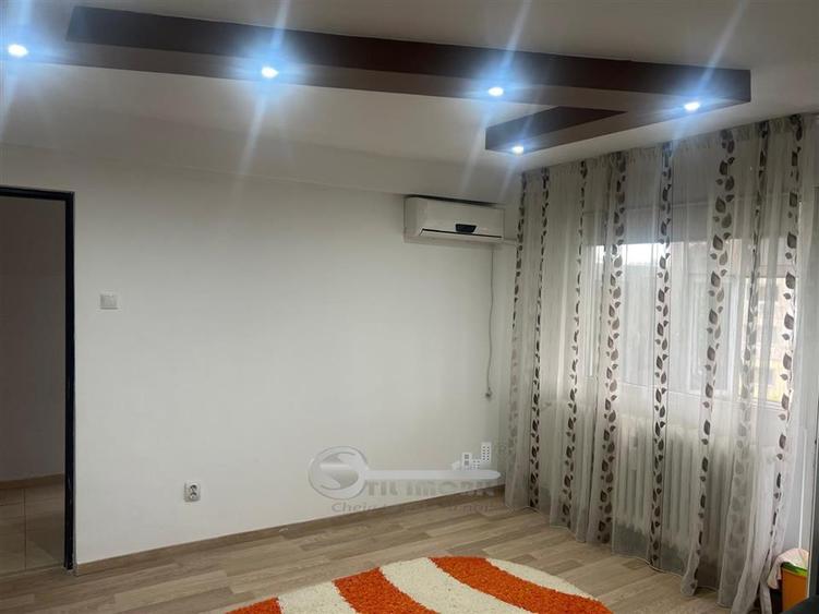 Apartament cu 2 camere semidecomandat, mobilat în Podu Roș