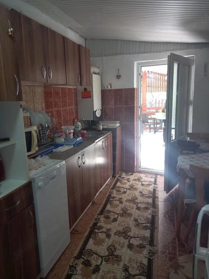 Casă cu Teren 1260 Mp în Muntenii de Jos