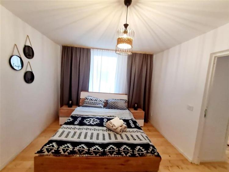 Apartament cu 2 camere semidecomandat, mobilat în Central