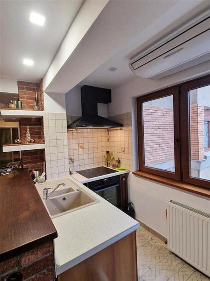 Apartament cu 4 camere decomandat în Central