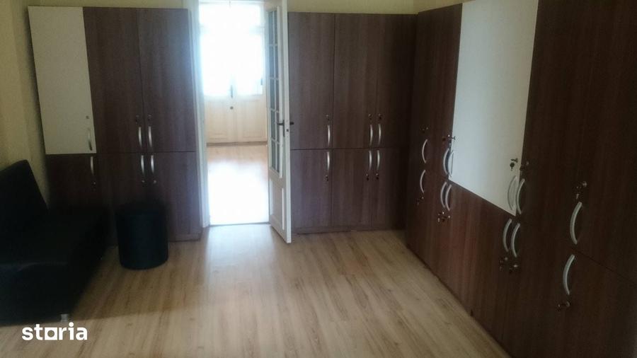 Casă cu 4 camere cu Teren 100 Mp în Central
