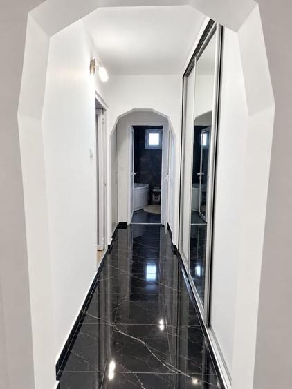Ap. 3 camere M 17 etaj 4/4 str Argesului. Se vinde mobilat si utilat complet. Centrala termica,aer conditionat,usi si geamuri termopan,izolatie ext. - 4