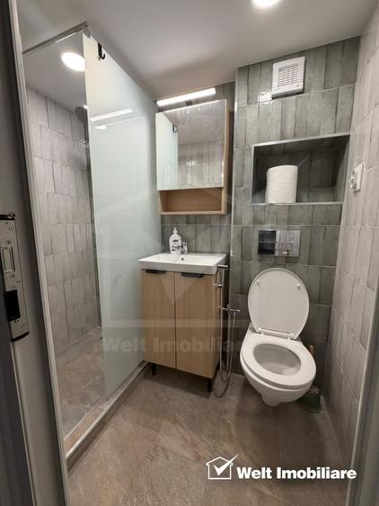 Apartament cu 2 camere semidecomandat, mobilat în Central