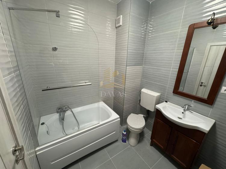 Penthouse cu 2 camere semidecomandat, mobilat în Central