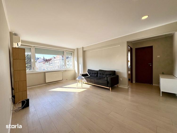 Apartament cu 2 camere semidecomandat, mobilat în Central