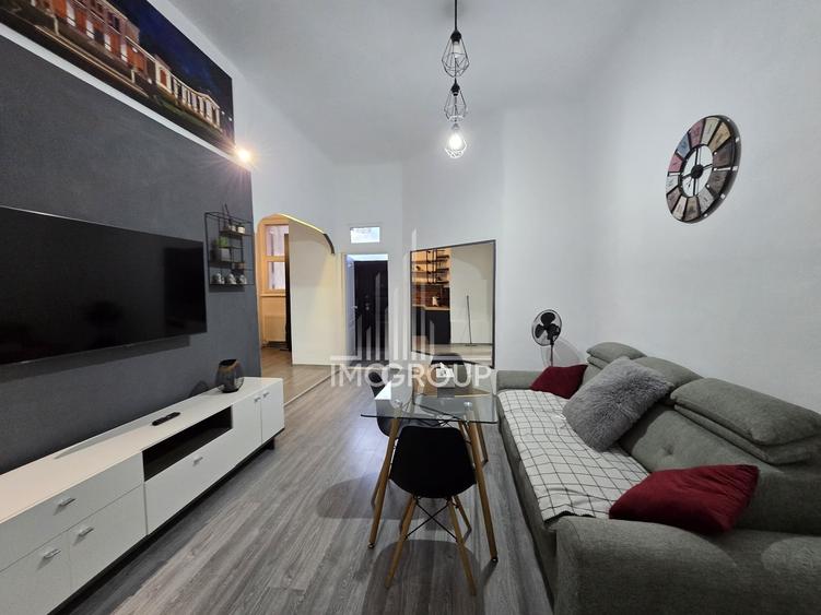 Apartament cu 3 camere semidecomandat, mobilat în Central