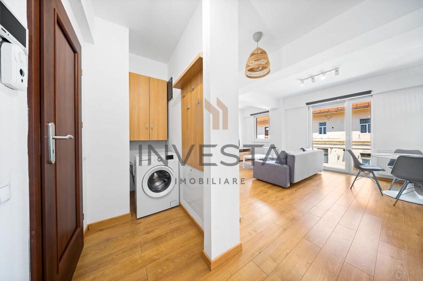 Apartament cu 3 camere semidecomandat, mobilat în Central