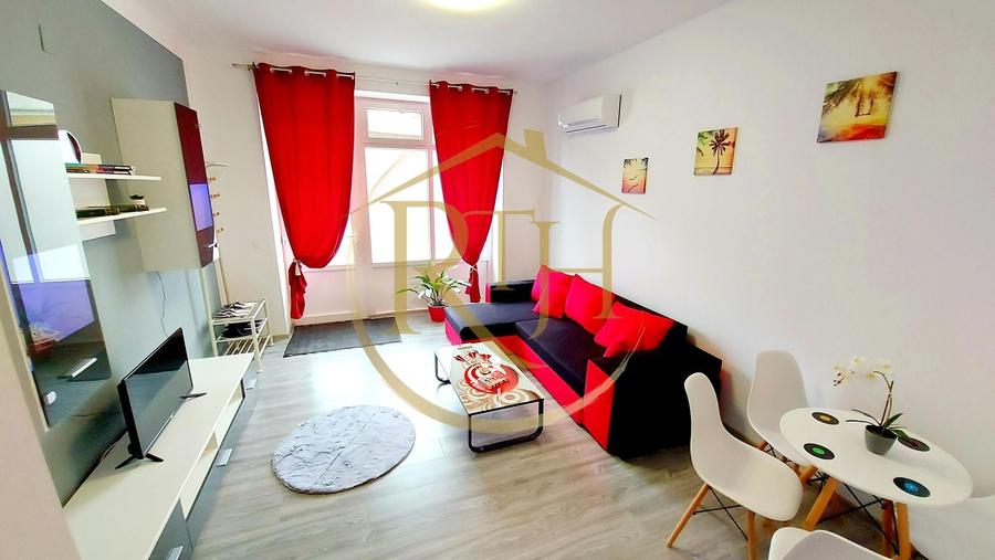 Apartament cu 2 camere semidecomandat, mobilat în Central