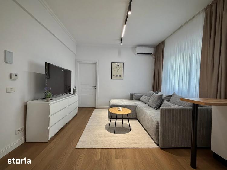 Apartament cu 2 camere semidecomandat, mobilat în 1 Mai
