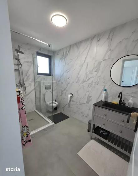 Casa individuala de vanzare cu 4 camere, amplasata pe un teren de 412 - 13