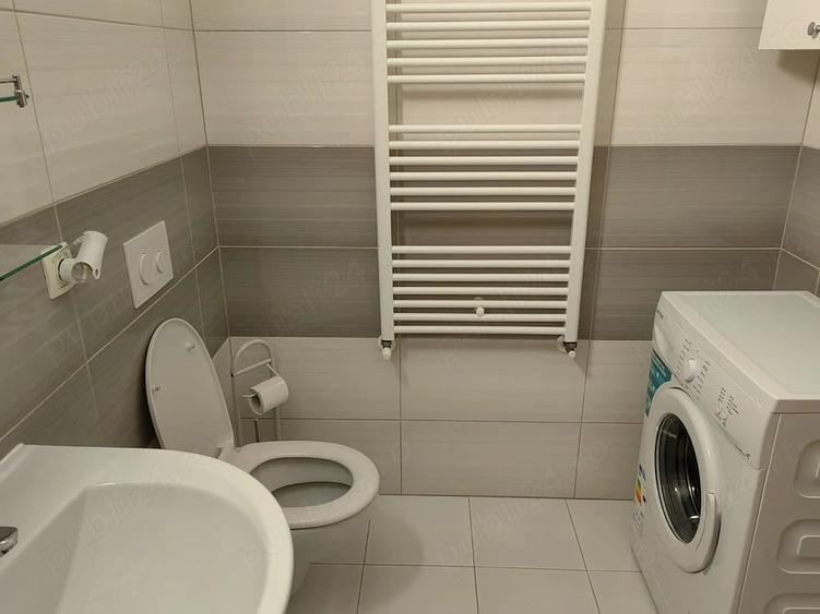 Apartament cu 2 camere decomandat în Tractorul