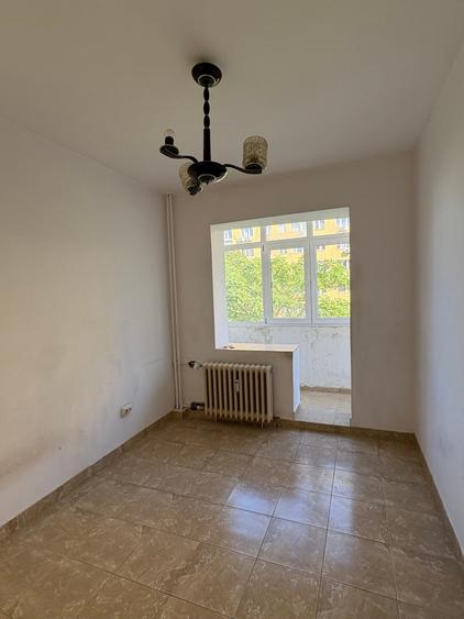 Apartament cu 3 camere decomandat în Ozana