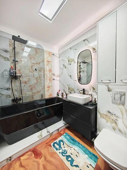 Apartament cu 4 camere decomandat în Titan