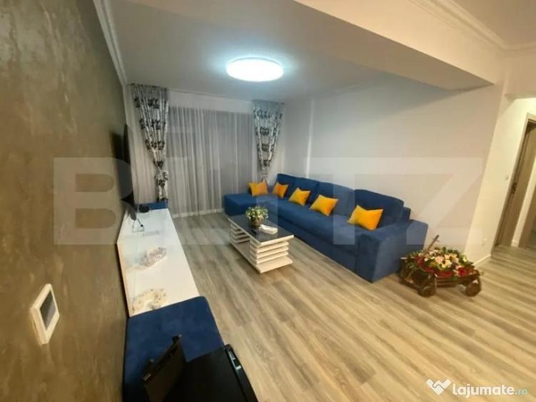 Apartament cu 3 camere semidecomandat în Calea București