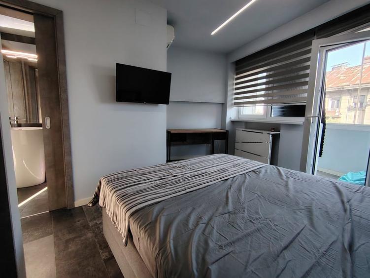 Apartament cu 2 camere semidecomandat, mobilat în Kogălniceanu