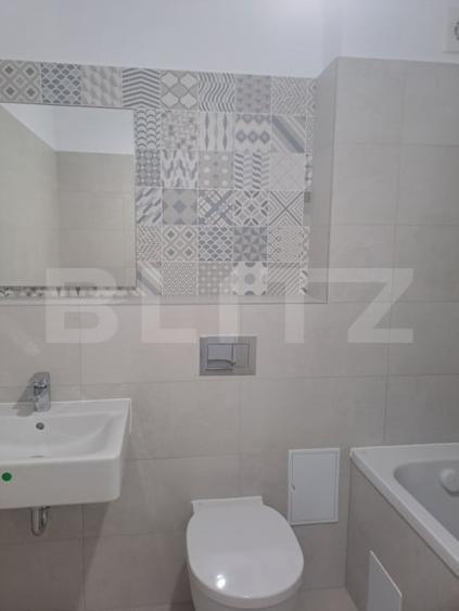 Apartament cu 3 camere decomandat în Tractorul