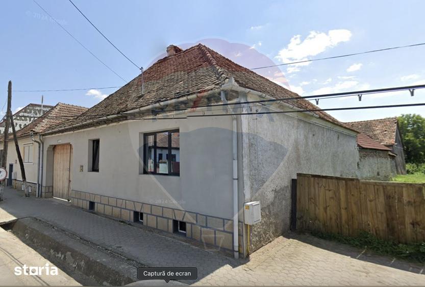 Casă cu 4 camere cu Teren 1346 Mp în Comana