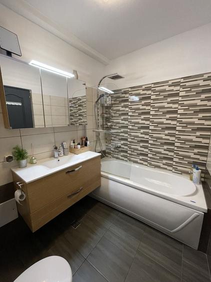 Apartament 2 camere 74,46 mp utili + terasa 6,31 mp, garaj subteran + loc de parcare exterior, boxa, complet mobilat si utilat. - 6