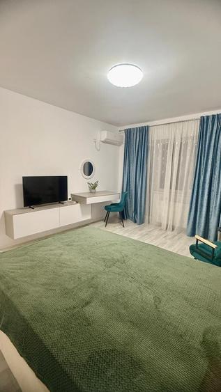 Garsonieră decomandată, mobilată în Podu Roș