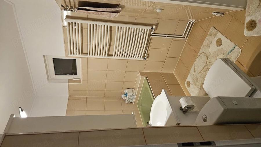 Apartament cu 4 camere decomandat în Noua