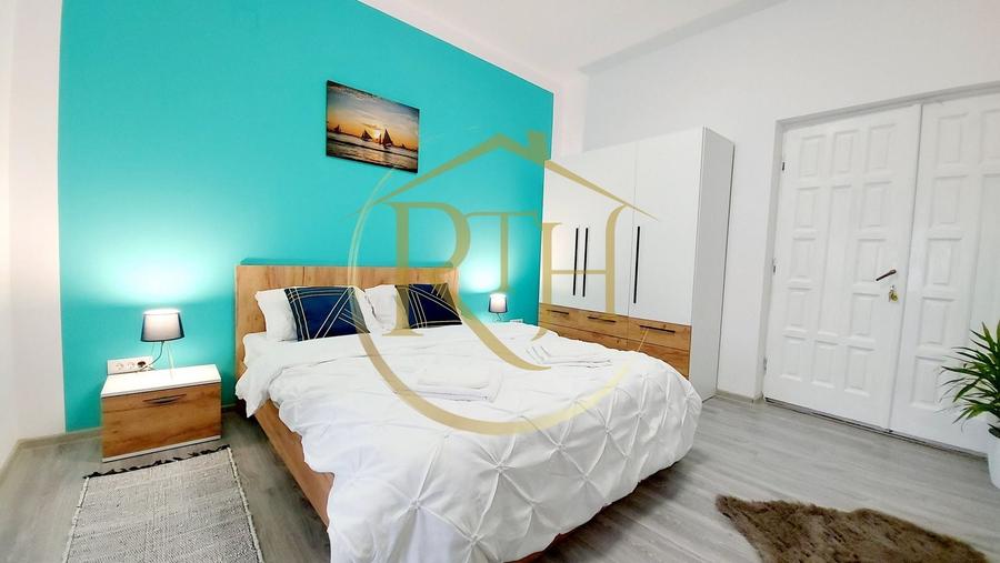 Apartament cu 2 camere semidecomandat, mobilat în Central