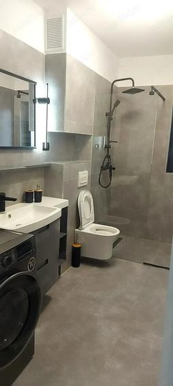 Apartament cu 2 camere semidecomandat, mobilat în Central