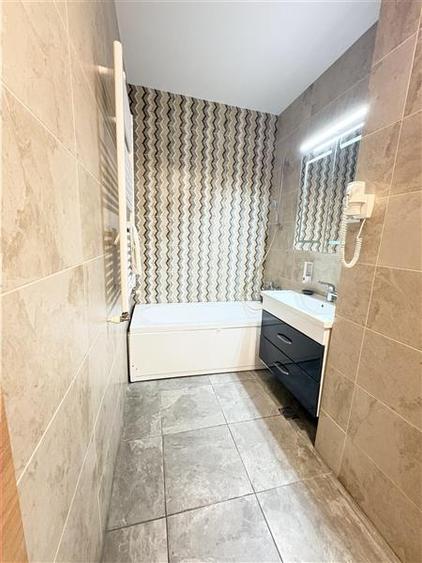 Apartament cu 2 camere decomandat, mobilat în Central