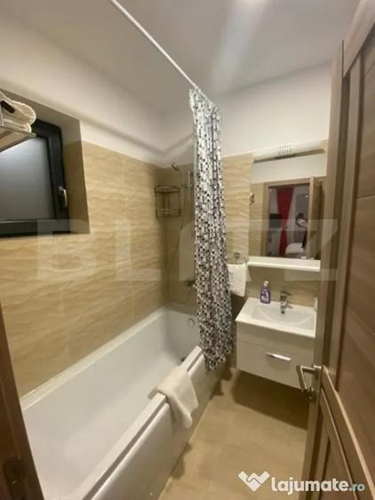 Apartament cu 3 camere semidecomandat în Calea București