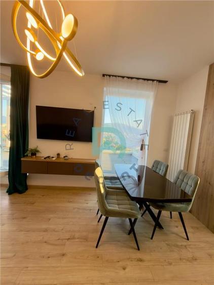 Apartament cu 3 camere decomandat în Tractorul