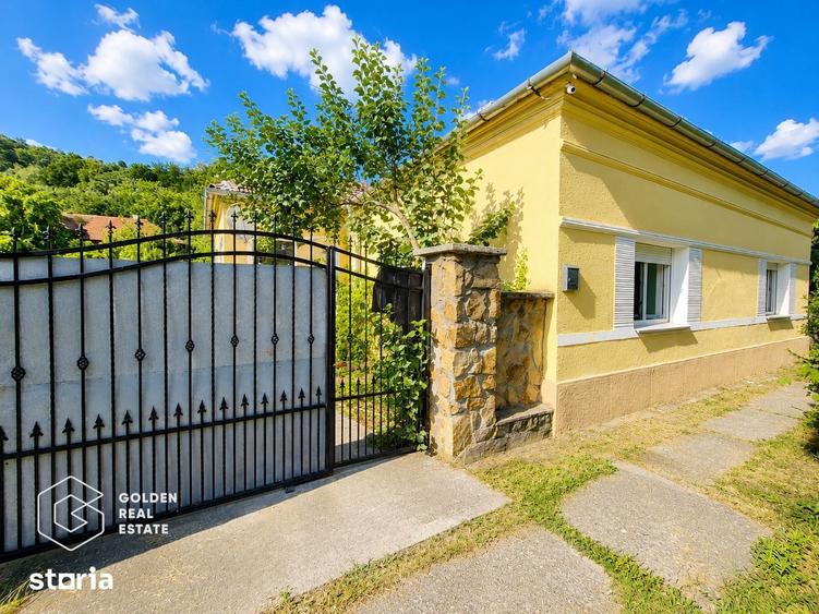 Casă cu 4 camere cu Teren 1224 Mp în Barațca