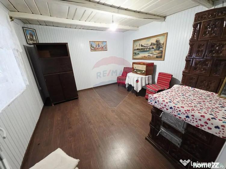 Casă cu 4 camere cu Teren 1677 Mp în Slobozia (Roznov)