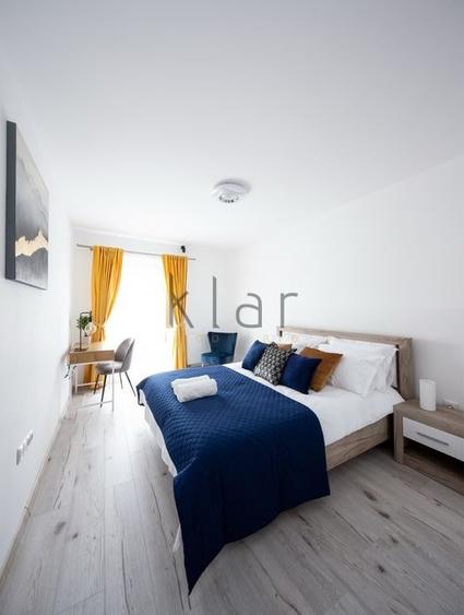 Apartament cu 2 camere semidecomandat, mobilat în Central
